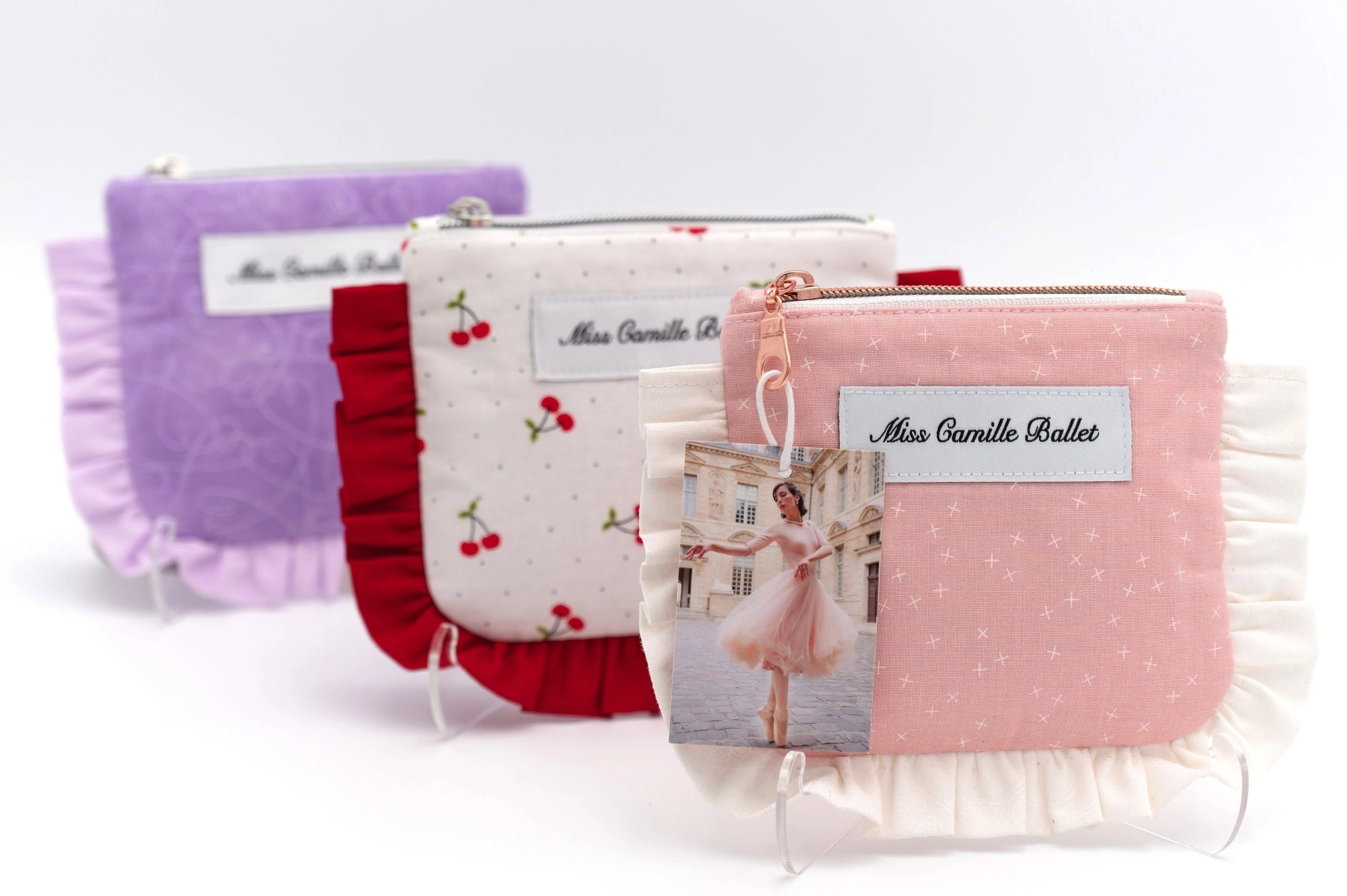Handmade hair accessories pouches in cherry, purple and pink